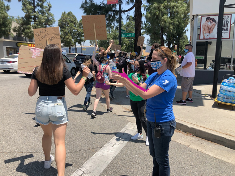 Volunteers handing out water bottles