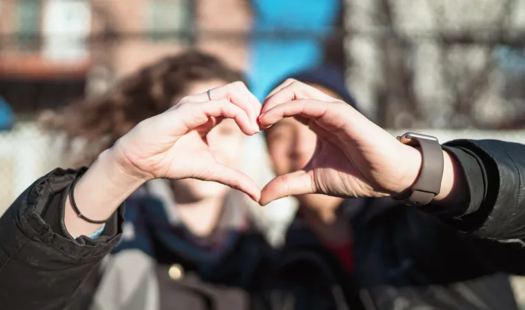 hands in shape of heart