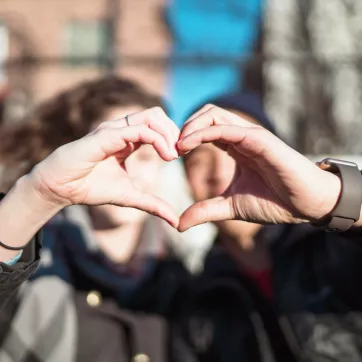 hands in shape of heart