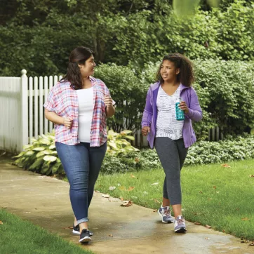 Family walking to help be healthy